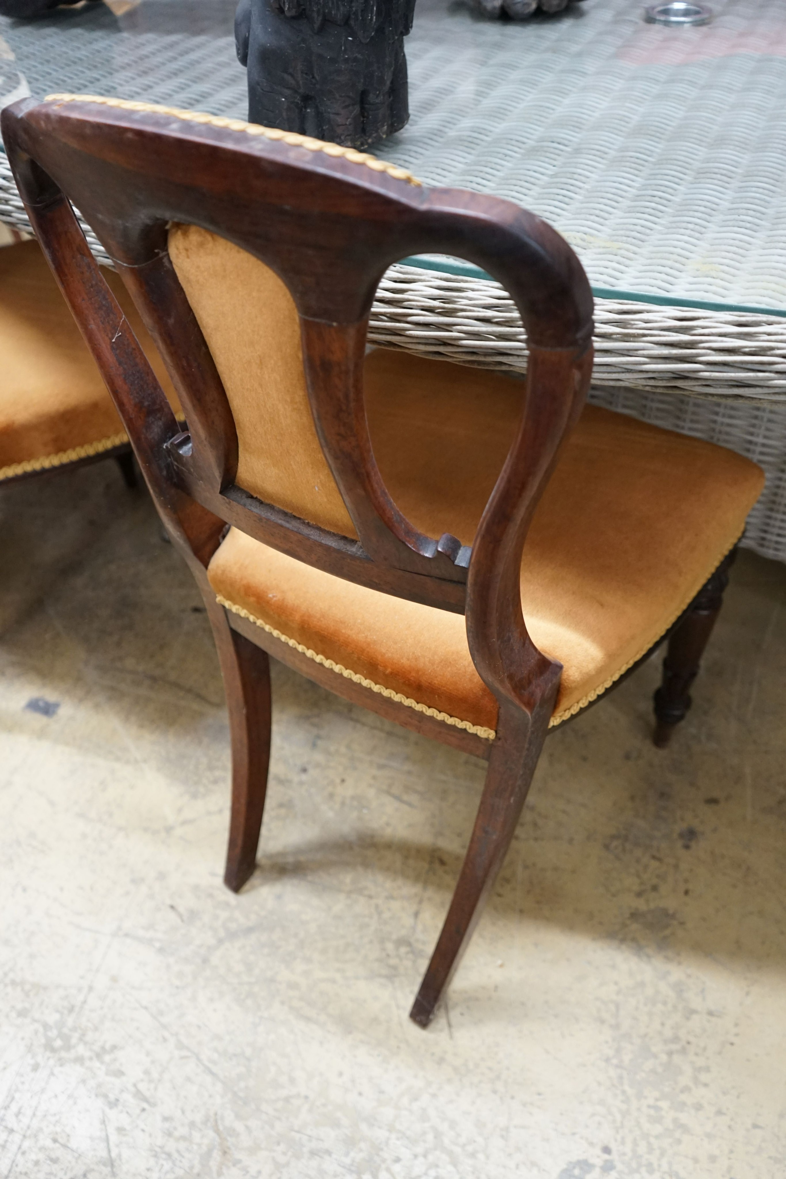 A set of five Victorian rosewood dining chairs